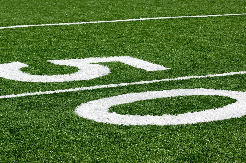 Close view of white markings on an artificial turf surface